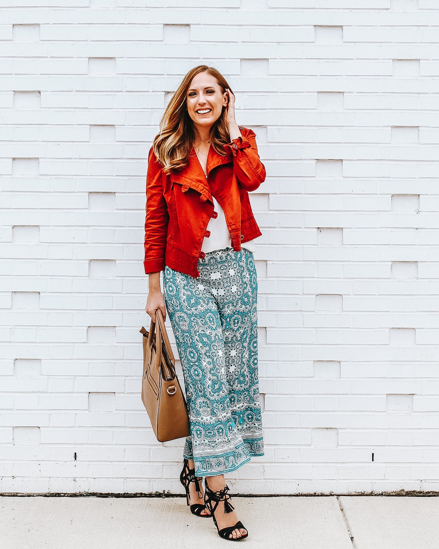 rust jacket and blue print pants